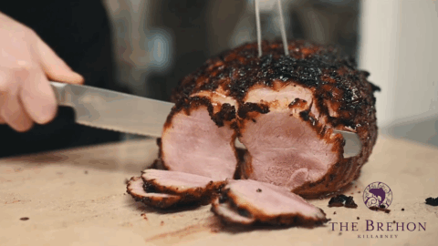 chef cutting cooked meat